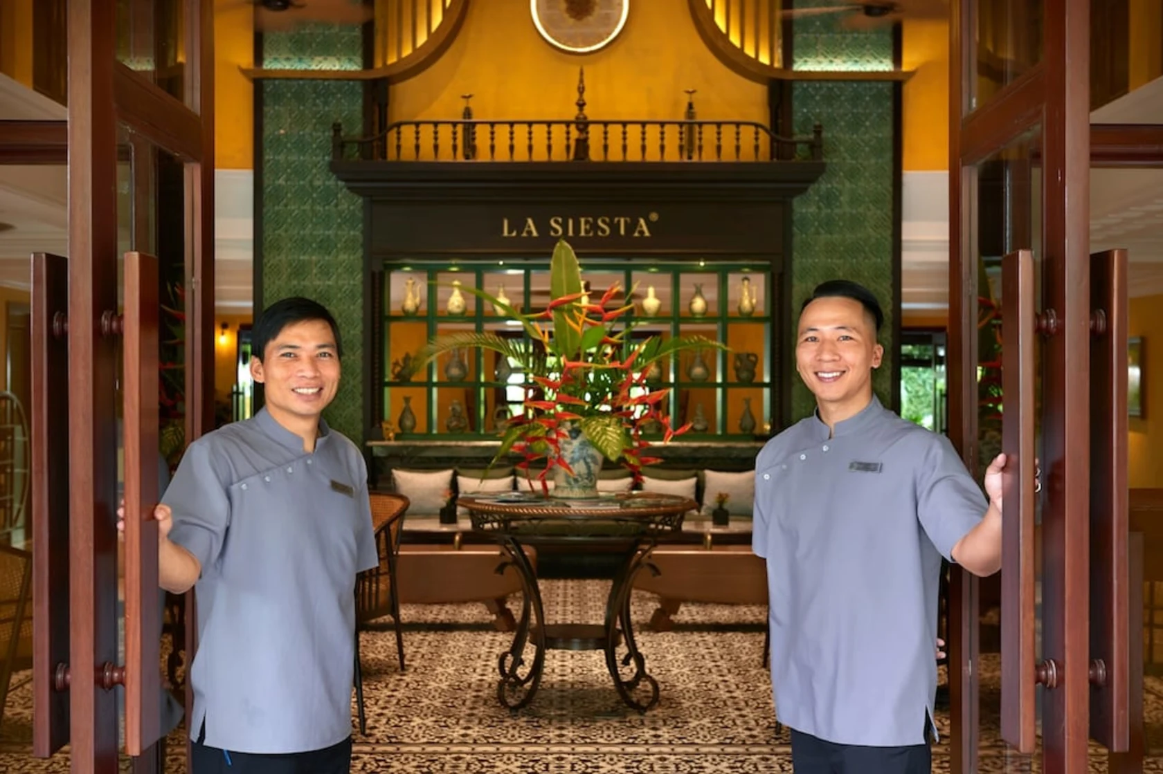 Outdoor lounge area beside koi ponds