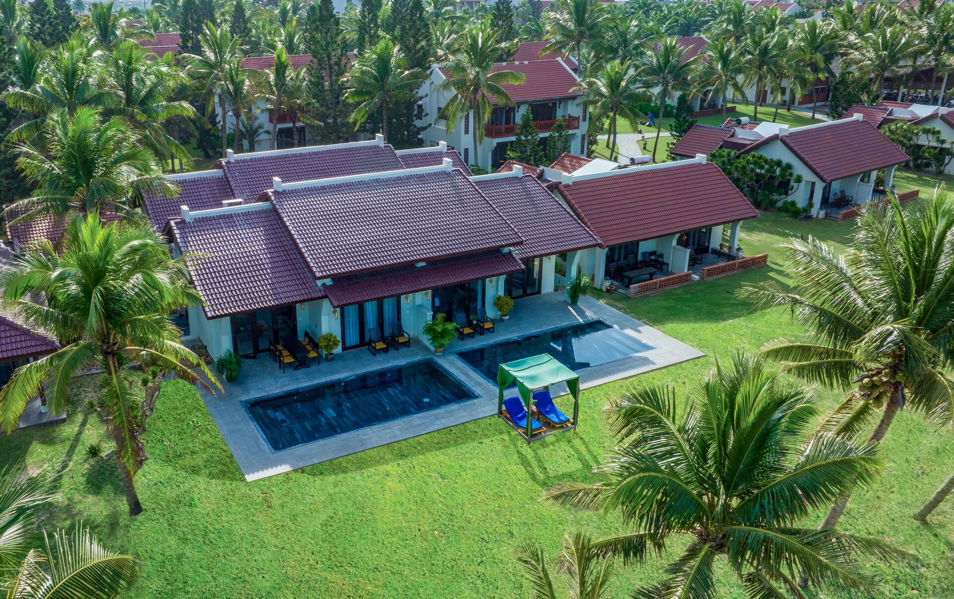Aerial view of Palm Garden’s lagoon pool and shoreline