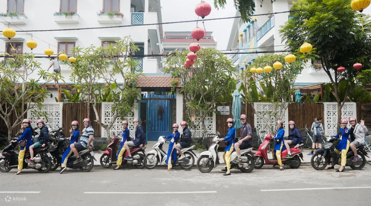 Aodai Rider guide sharing heirloom dishes during a private food tour