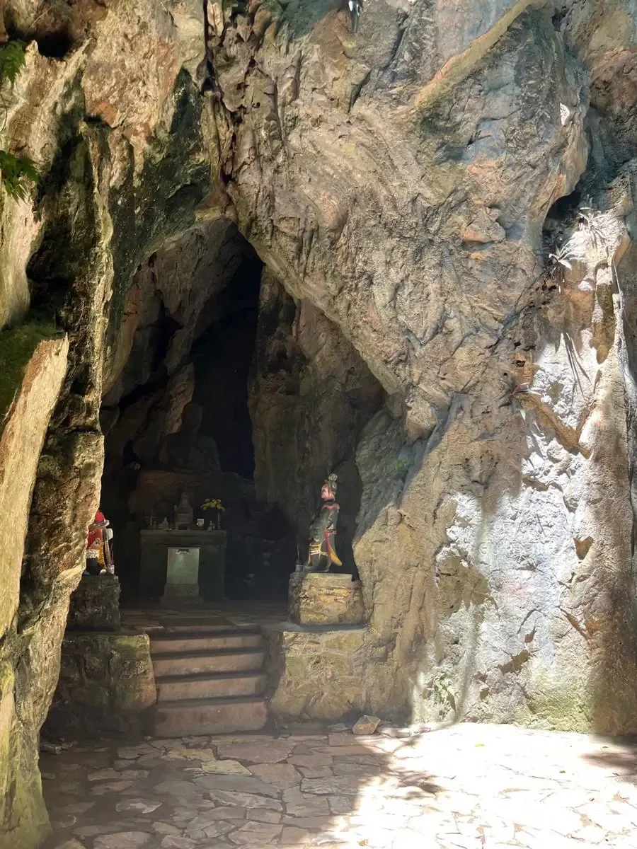 Sun rays entering a Marble Mountain cave
